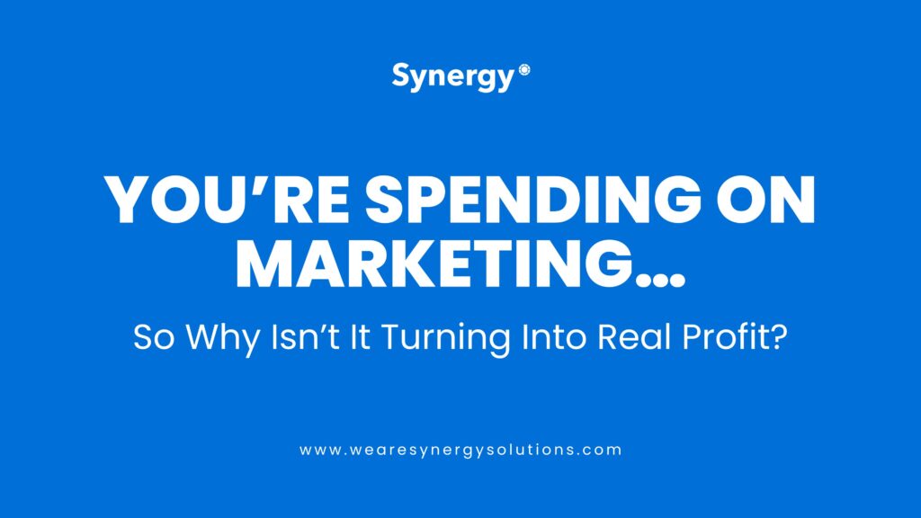 Synergy Solutions graphic with the text “You’re Spending on Marketing… So Why Isn’t It Turning Into Real Profit?